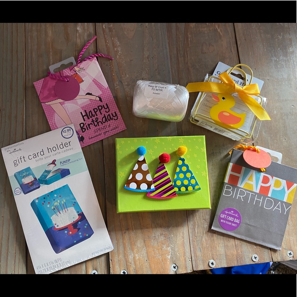 Bundle of gift card holders and curling ribbon